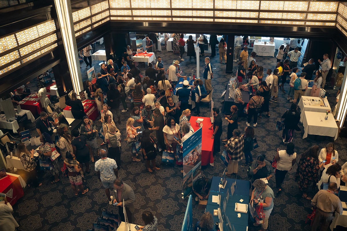 Overhead view of networking event in hotel atrium